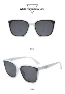 Close-up of white square sunglasses with dark grey lenses and metal temple detail