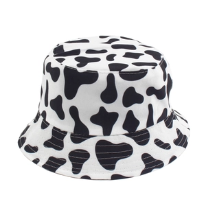 Chapeau bob réversible avec motif imprimé vache noir et blanc pour protection solaire