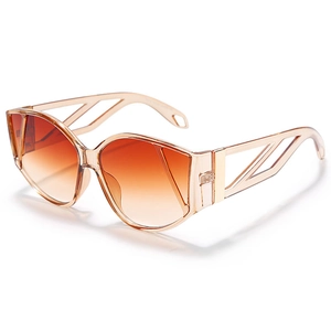 Avant-garde cat eye sunglasses with brown frame and orange gradient lenses