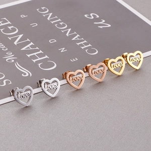 Minimalist heart-shaped love stud earrings in gold, rose gold, and silver finishes