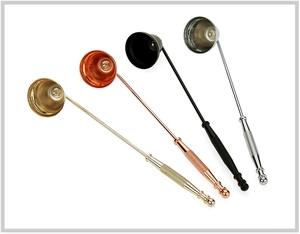 Detailed set of four metal candle wick trimmers in gold, rose gold, black, and silver finish