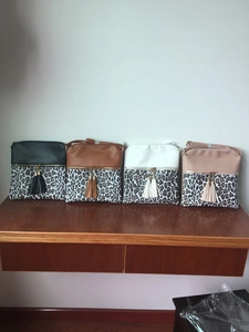 Multiple color options of leopard print crossbody bags with stylish long tassels