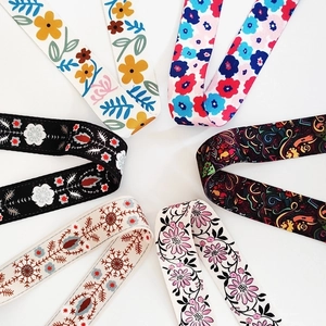 Adjustable woven replacement shoulder straps with colorful floral and ethnic patterns