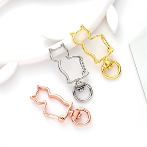 Three-pack of cat-shaped metal keychains in gold, silver, and rose gold finishes