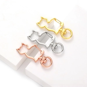 Cat-shaped metal keyhooks in gold, silver, and rose gold with 360-degree swivel rings