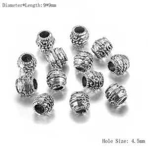 Détail de perles d'espacement argentées de 9mm avec trou de 4,5mm pour création bijoux