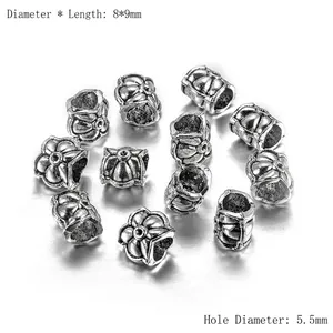 Détails macro de perles d'espacement de 8x9mm en alliage argenté antique pour bijoux DIY