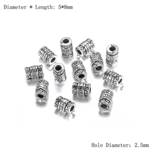 Détail des perles d'espacement de 5x8mm en alliage d'argent avec motifs tribaux gravés