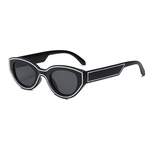 Retro cat eye sunglasses with black frames and white outline accents for women