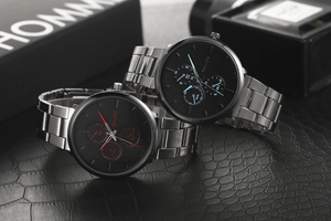 Close-up of YOLAKO men's quartz watches with stainless steel bands and three-eye dials