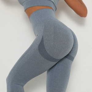Close-up of seamless high-waisted yoga pants with breathable textures and push-up effect