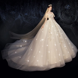 Luxury off-shoulder champagne wedding dress with sequined star pattern and long train