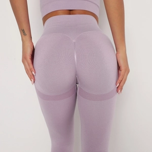 Close-up of seamless light purple yoga pants with high waist and push-up effect