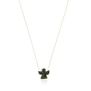 Rose gold necklace with green and black sparkling angel pendant on white background