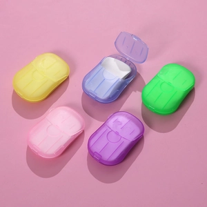 Portable disposable soap paper sheets in five colors with a translucent travel case