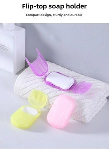Portable soap sheet dispensers in purple, yellow, and pink for travel hand washing