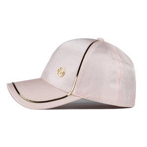 Detail of pink satin baseball cap with golden M logo and metallic line piping trim