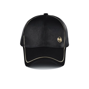 Fashionable black baseball cap with gold trim and metallic M logo in a sleek design