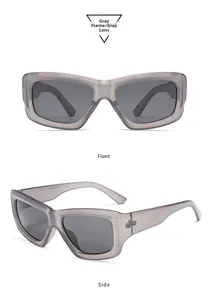 Detail view of thick gray translucent frame sunglasses with dark polarized lenses