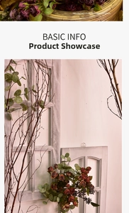Retro dried rose arrangement with eucalyptus and berries in vintage wooden frame