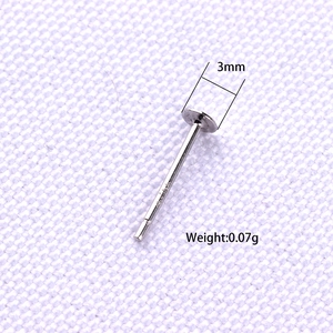 Macro detail of S925 sterling silver 3mm flat head ear post with weight and hallmark
