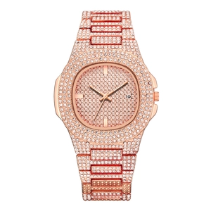 Elegante orologio al quarzo da donna in oro rosa con strass e datario integrato