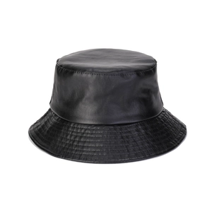 Close-up of black PU leather bucket hat with detailed stitching and smooth texture