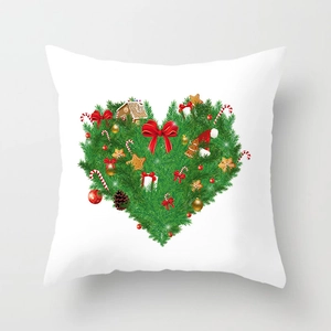 Detailed Christmas wreath heart pattern with gingerbread men on white cushion cover