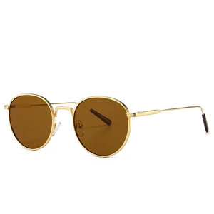 Retro round metal sunglasses with gold frame and dark brown lenses at 45-degree angle