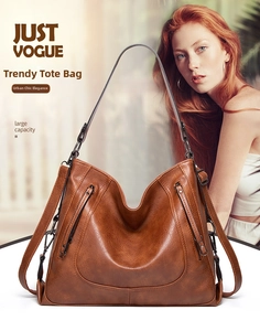 Braune Shopper-Tasche aus Leder mit vertikalen Reißverschlusstaschen und viel Stauraum
