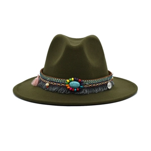 Detail of olive green fedora hat featuring bohemian beaded band and turquoise stone