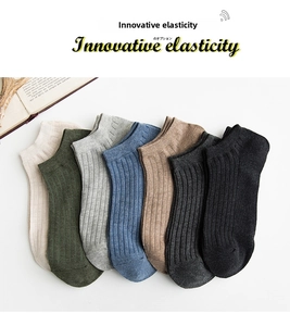 Detail of seven pairs of ribbed low-cut cotton socks with innovative elastic finish