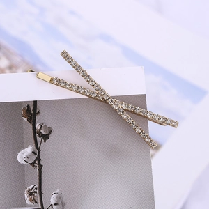 Elegant gold cross rhinestone hairpin featuring a minimalist double-row crystal design