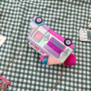 Detail of laser PU ice cream truck crossbody bag with colorful patch embroidery