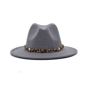 Detail of grey fedora hat with leopard print band and gold star metal rivets decoration