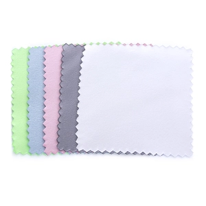 Microfiber jewelry polishing cloths in various colors with scalloped edges for silver care