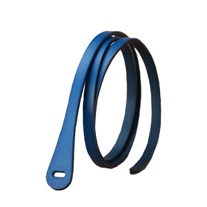 Minimalist blue leather thin belt for women with black edge finish on white background