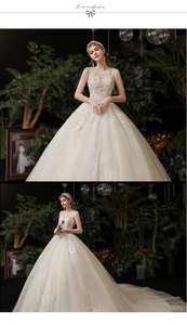 Detail of bridal ball gown featuring delicate lace embroidery, sequins, and a long train