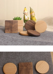 Macro detail of walnut and beech wood coasters showing grain texture and round square shapes