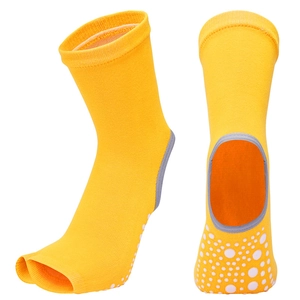 Yellow open-toe yoga socks with white non-slip grips and professional heel cutout