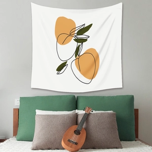 Close-up of bohemian wall tapestry featuring abstract fruit art and nordic style patterns