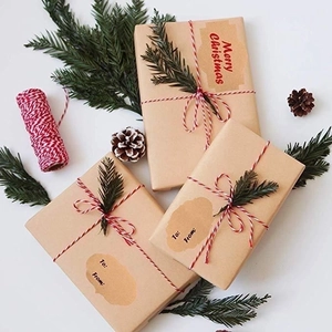 Roll of 300 Kraft paper Christmas gift stickers with Merry Christmas greeting and tags