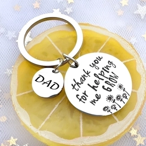 Father's Day stainless steel keychain with DAD charm and thank you message on lemon