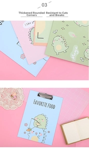 Detail of colorful cartoon clipboards with high-strength silver metal clips for office use