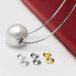 Macro shot of S925 sterling silver hallmarked pendant with lustrous white pearl