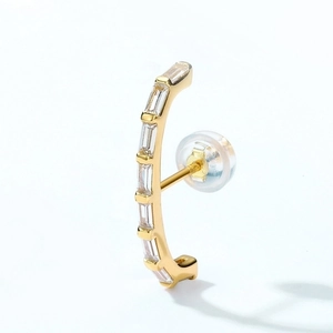 Minimalist geometric gold drop earring with rectangular white cubic zirconia stones