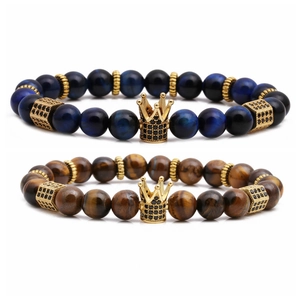 Tiger eye stone bead bracelet set featuring gold crown accents and natural stone textures