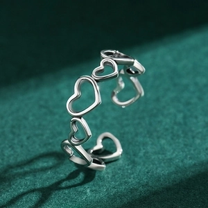 Adjustable S925 sterling silver hollow heart ring with elegant heart-shaped shadow effect
