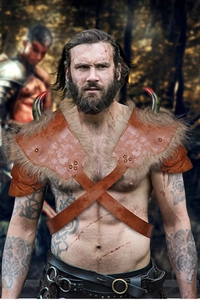 Detail of Viking PU leather shoulder armor with faux fur and horn accents for men