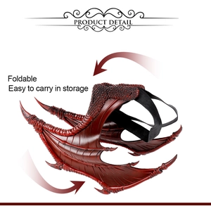 Detailed view of foldable dark red dragon wings with textured scales for easy storage